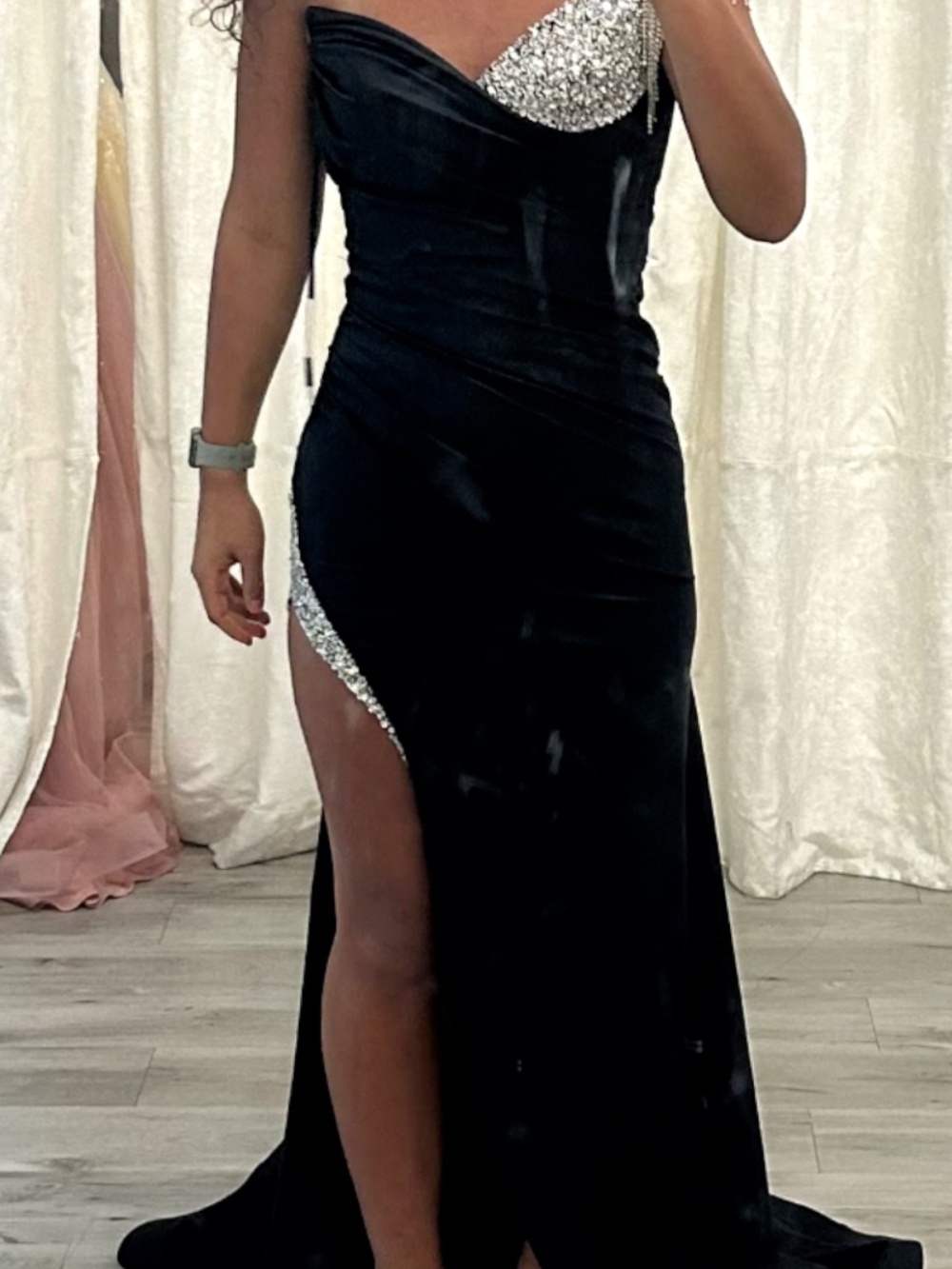 Black one shoulder formal dress with silver accents